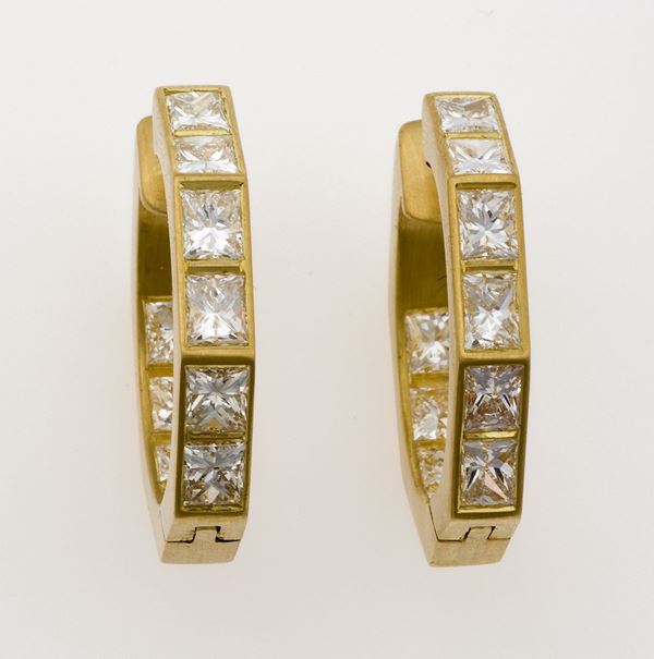 Pair of diamond and gold earrings. Signed Enrico Cirio
