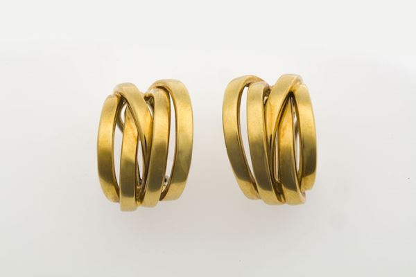 Pair of gold earrings. Signed Raima