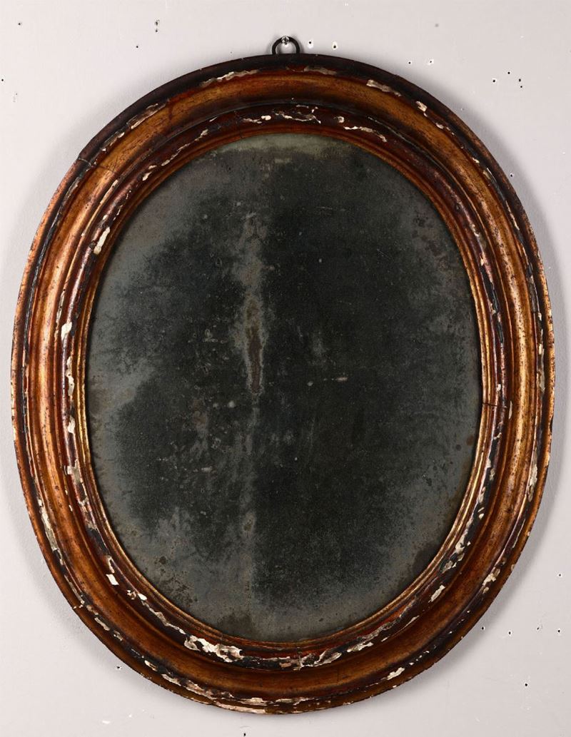 Specchiera ovale in legno dorato, XIX secolo  - Asta Arredi - Cambi Casa d'Aste