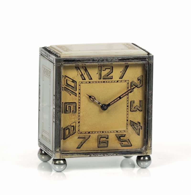 Anonimo. Piccolo orologio da tavolo, in argento e avorio. Realizzato nel 1920 circa  - Asta Orologi da polso e da tasca - Cambi Casa d'Aste