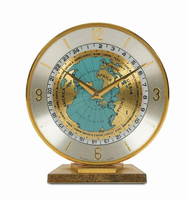 Cortland, Concord Watch. Orologio da tavolo, ore del mondo, in ottone dorato, 8 giorni riserva di carica. Realizzato nel 1960 circa