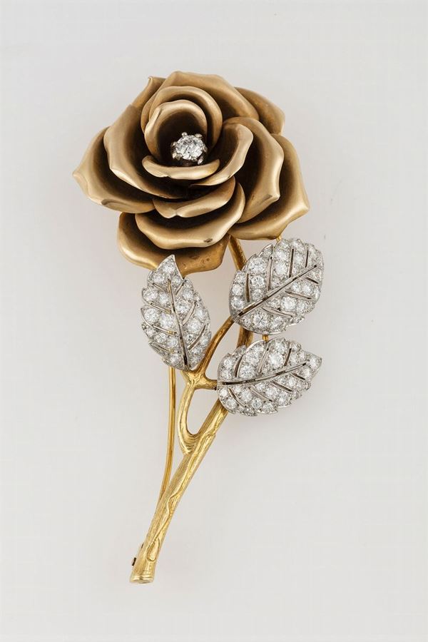 Brilliant-cut diamond and gold brooch. Signed B.S & F.
