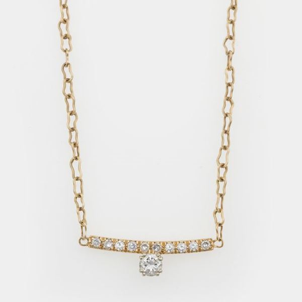 Diamond and gold necklace.