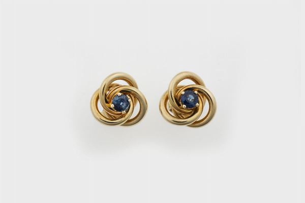 Pair of sapphire and gold earrigs. Signed Tiffany & Co. Fitted case