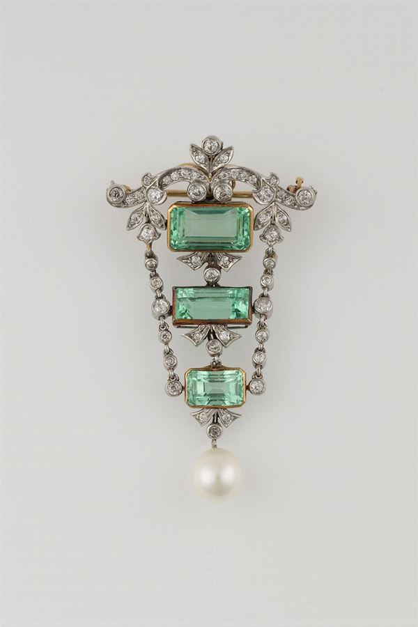 Emerald, diamond and pearl brooch/pendant. Signed Marcus & Co.