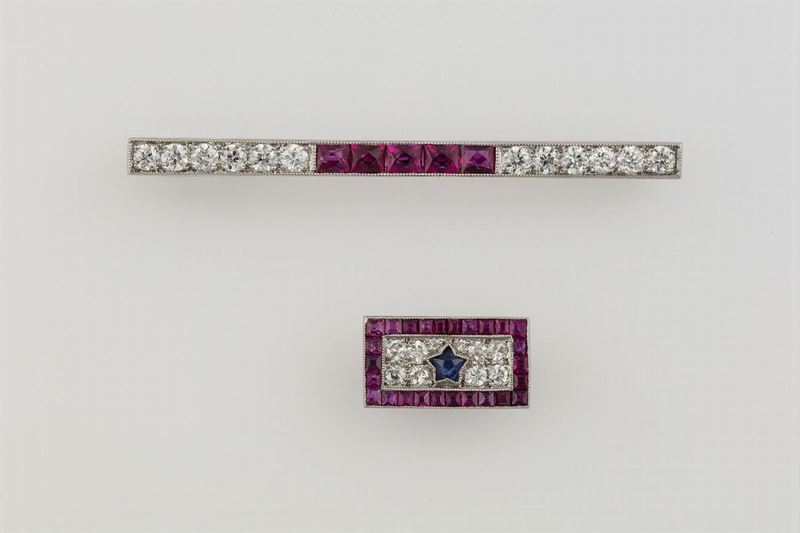 Two diamond, ruby and sapphire brooches. One of these is made of platinum and signed Marcus&Co.  - Auction Fine Jewels - Cambi Casa d'Aste