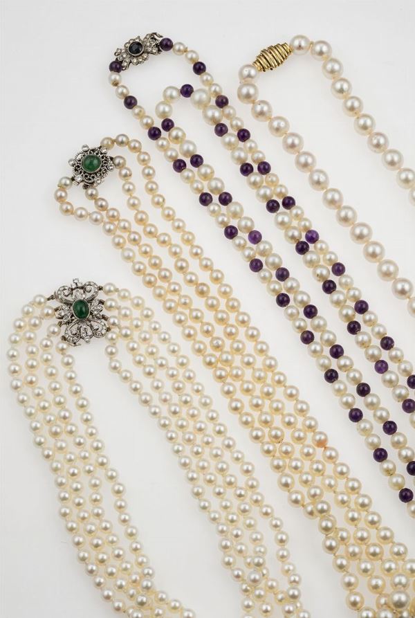 Four cultured pearl necklaces