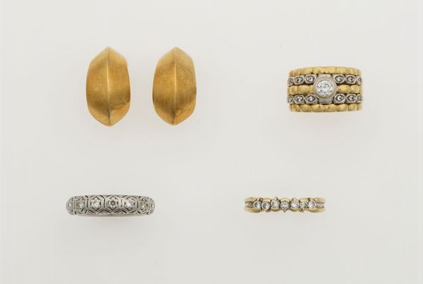 Pair of gold earrings and three gold and diamond rings