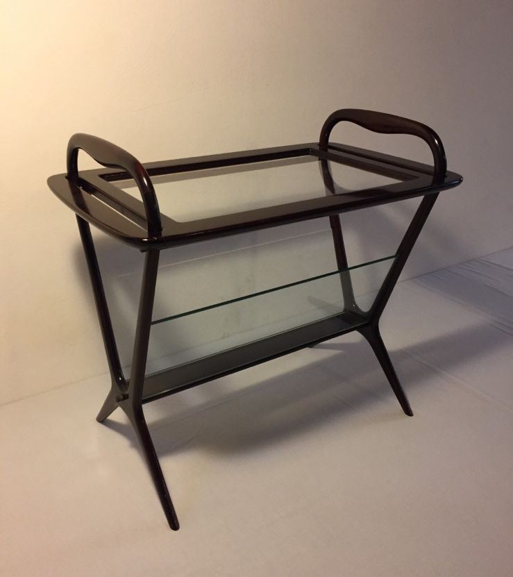 Portariviste con struttura in legno laccato e pannelli in vetro.  - Asta Design - Cambi Casa d'Aste