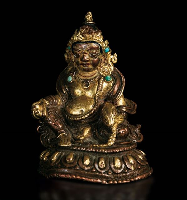 A gilt bronze Sita-Jambala, Tibet, 1600s