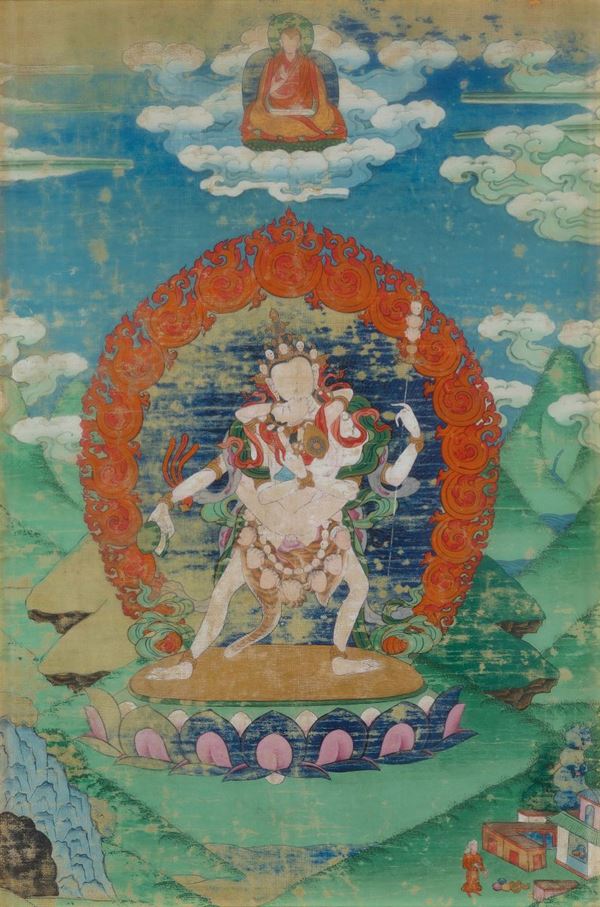 Thangka su seta entro cornice con figura centrale di divinità in Yab-Yum sovrastata da Buddha, Tibet, XIX secolo