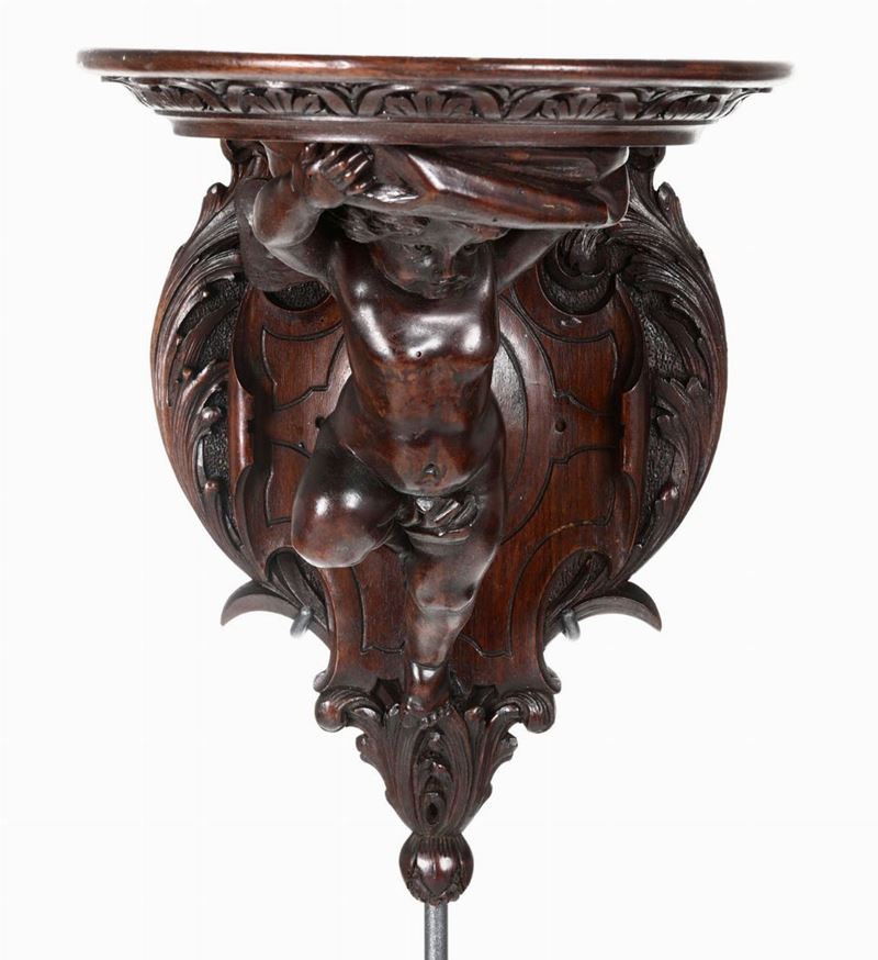 Mensola in legno scolpito con putto, XIX-XX secolo  - Asta Ceramiche e Antichità - Cambi Casa d'Aste