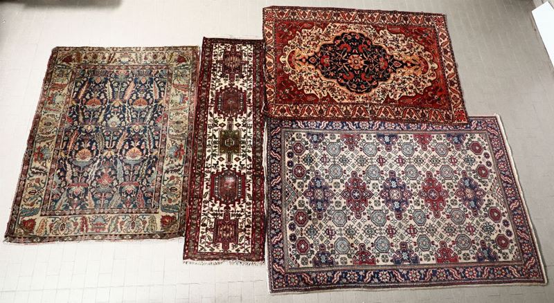 Lotto di quattro tappeti persiani.  - Asta Arredi - Cambi Casa d'Aste