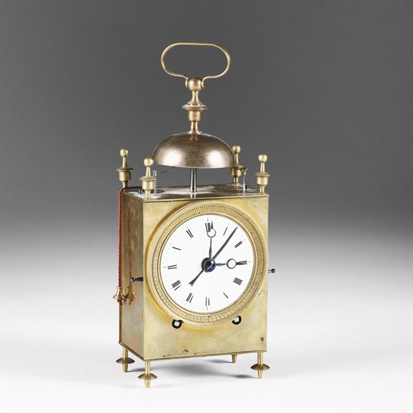 Orologio da tavolo in metallo dorato, inizio XIX secolo