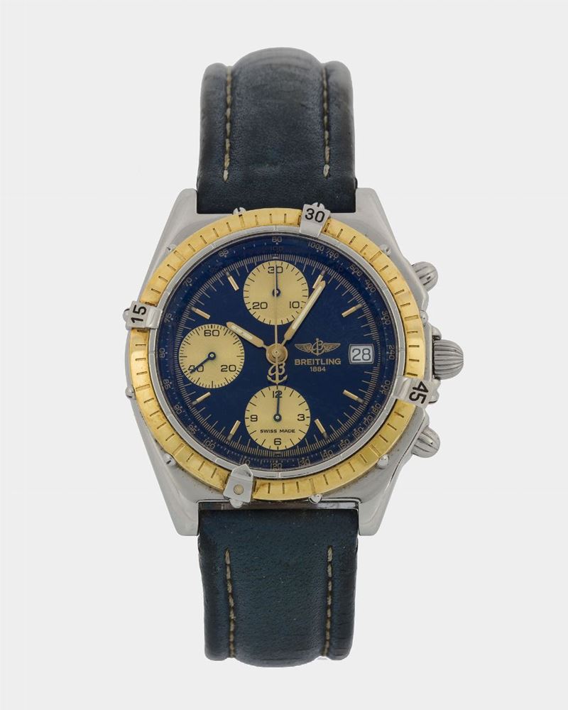 Breitling, Chronomat, Ref. D13050. Fine, self-winding, water-resistant, stainless steel and 18K yellow gold  wristwatch with date, round button chronograph, registers, tachometer and a stainless steel Breitling buckle. Made circa 1990.  - Auction Watches - Cambi Casa d'Aste