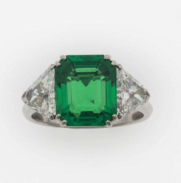 Emerald, diamond and platinum ring