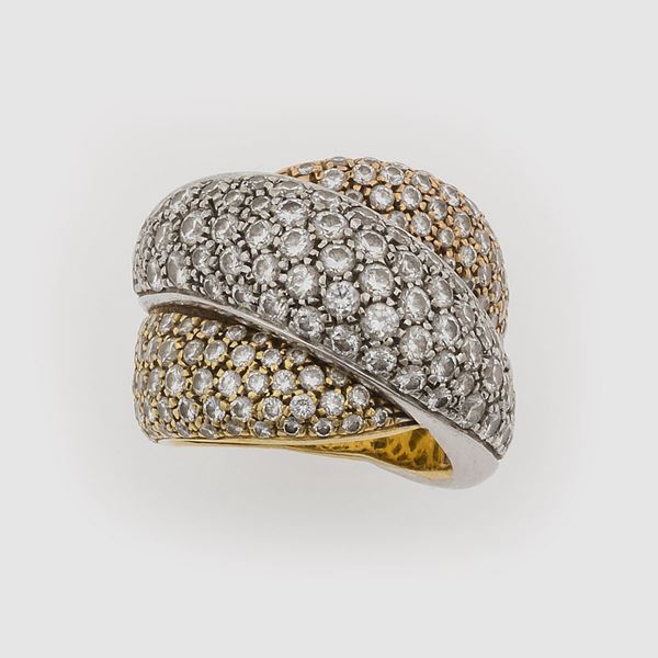 Diamond and gold ring. Signed Damiani