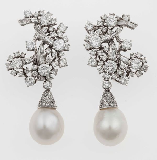Pair of diamond and pearl earrings. Signed G. Petochi. Fitted case