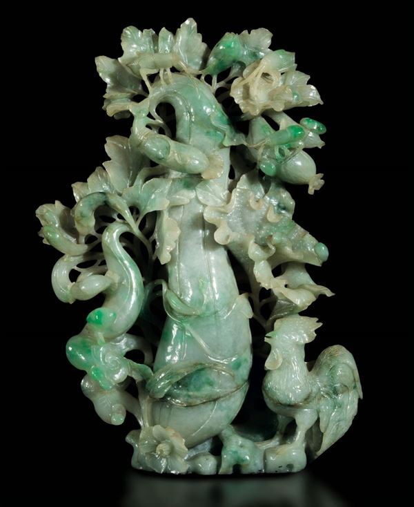 A carved jadeite group, China, early 1900s