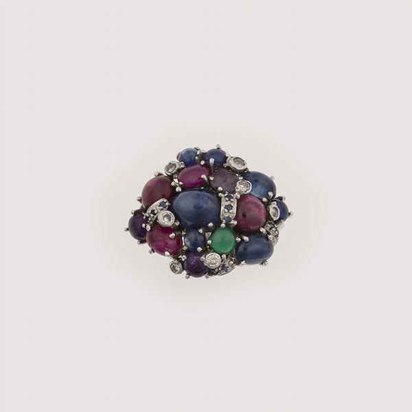 Emerald, sapphire, ruby and diamond ring