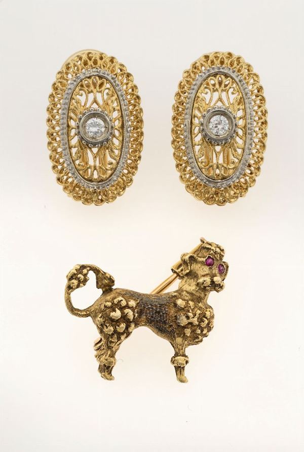 Pair of gold and diamond earrings and gold and ruby brooch