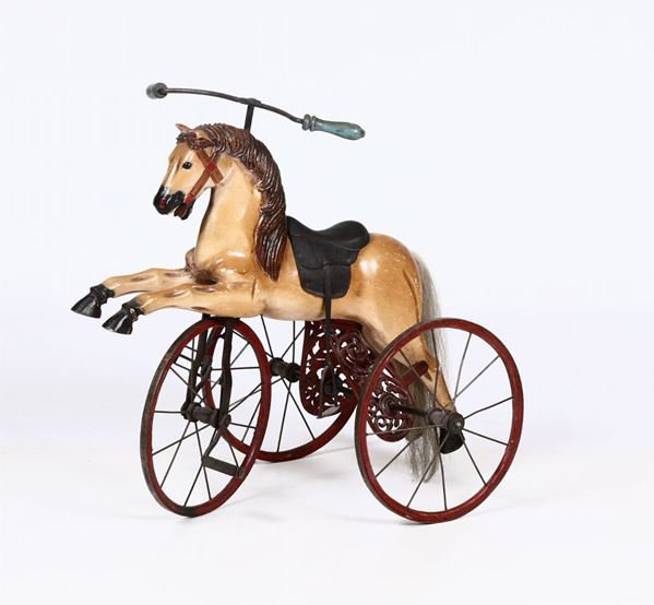 Triciclo con cavallo a dondolo