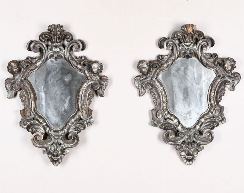Coppia di specchiere con cornici in legno intagliato e argentato, XVIII secolo  - Asta Antiquariato - Cambi Casa d'Aste