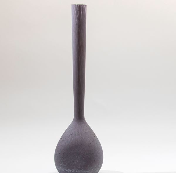 A solifleur glass vase with an enamel decor.