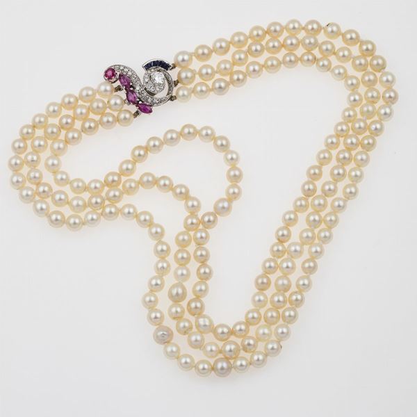 Cultured pearl necklace with gold, ruby, sapphire and diamond clasp