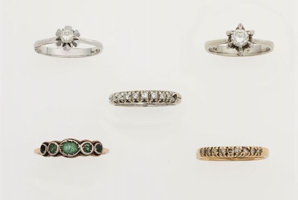 Five gold, diamond and emerald rings