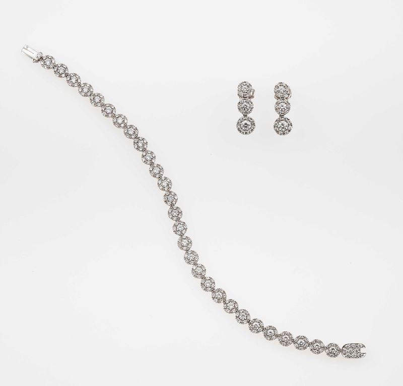 Bracciale ed orecchini con diamanti taglio brillante per ct 5,16 totali  - Asta Fine Jewels - II - Cambi Casa d'Aste