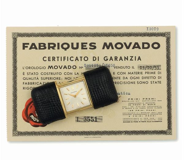 Movado. Fine, leather covered gilt brass Ermeto, extensible keyless purse watch. Sold in 1953. Accompanied by the original Certificate and box
