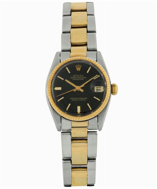 Rolex, Oyster Perpetual Datejust, Superlative Chronometer Officially Certified, case No. 5936815,  Ref. 6827. Fine, center seconds, self-winding, water-resistant, 18K yellow gold mid-sized wristwatch with date and an 18K yellow gold  and steel Rolex bracelet with deployant clasp. Made circa 1978