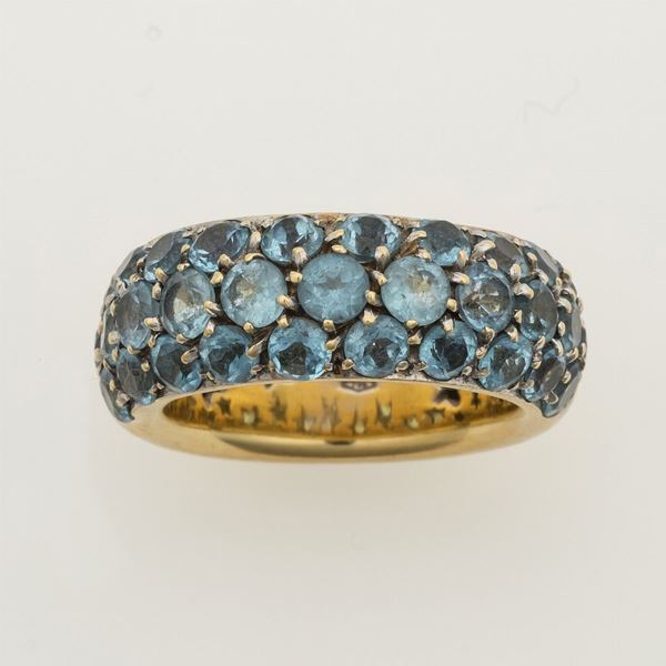Blue topaz and gold ring. Signed H. Stern