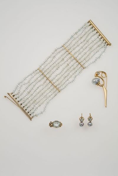 Lotto Composto da un Bracciale ed un Anello con Acquamarina ed una Spilla ed un Paio di Orecchini...