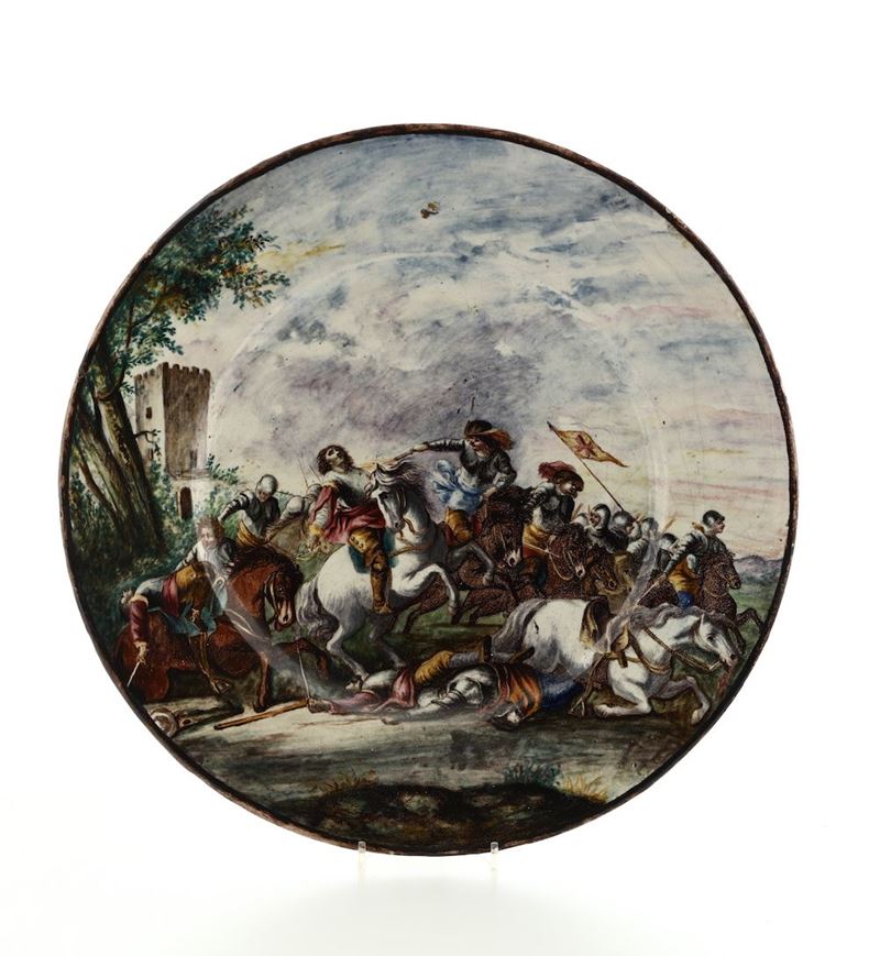 Grande piatto in maiolica con battaglia, manifattura del XIX-XX secolo  - Asta Ceramiche e Antichità - Cambi Casa d'Aste