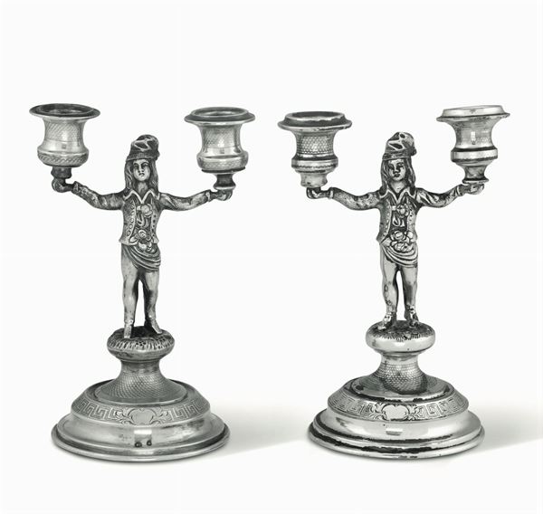 Two silver candle holders, late 18-1900s