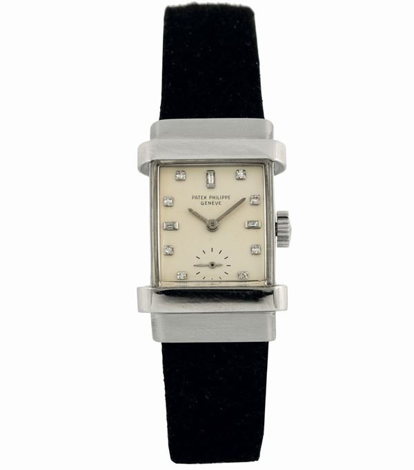 PATEK PHILIPPE, Genève, Ref. 1450. Raro, orologio da polso, di forma rettangolare, in platino e quadrante in brillanti. Realizzato nel 1950 circa