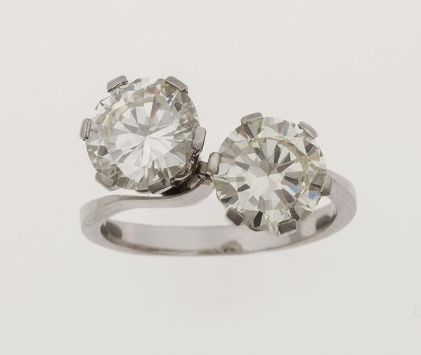 Two brilliant-cut diamonds weighing 2.49 and 2.80 carats