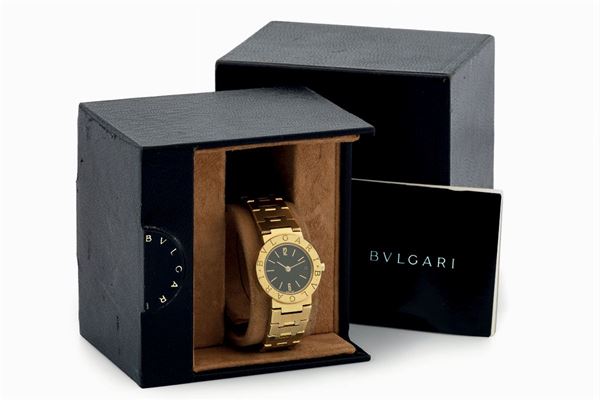 Bvlgari, Ref. BB 23 GGD. Fine and elegant, 18K yellow gold quartz lady's wristwatch with integrated 18K yellow gold Bvlgari bracelet. Accompanied by a box and Guarantee. Sold in 1986