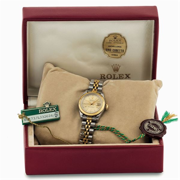 Rolex, Oyster Perpetual, Datejust, case No. L332624, Ref. 69173. Fine, center seconds, self-winding, water-resistant, stainless steel and 18K yellow gold lady's  wristwatch with date and a stainless steel and 18K yellow gold Rolex Jubilee bracelet with deployant clasp. Accompanied by the original fitted box, Warranty, booklets, additional link and hang tags. Made circa 1989