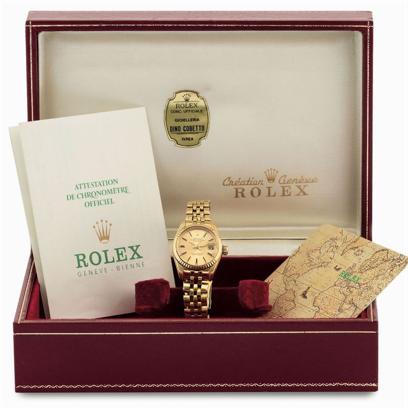 Rolex, Oyster Perpetual, Datejust, Superlative Chronometer, Officially Certified, case No. 6068997, Ref. 6917. Fine, center seconds, self-winding, water resistant, 18K yellow gold lady's  wristwatch with date  and an  18K yellow gold Rolex  bracelet with deployant clasp. Accompanied by the original box, Guarantee and booklet Sold in 1979  - Auction wrist and pocket watches - Cambi Casa d'Aste