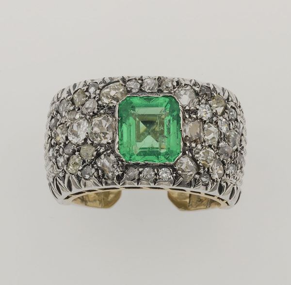 Emerald, diamond, gold and silver ring