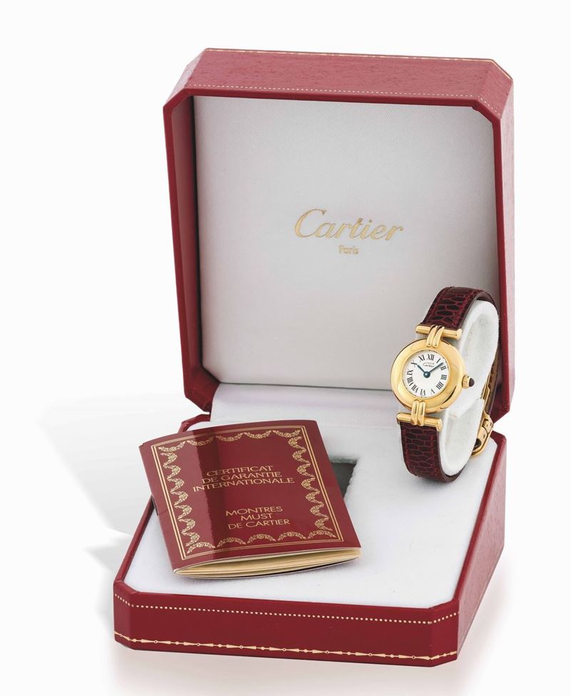 Cartier, Must de Cartier, No. 0942/1847. Fine and elegant, gold plated lady's quartz wristwatch with original gold plated deployant clasp. Accompanied by the original box and Guarantee. Sold in 1998.  - Auction Important Wristwatches and Pocket Watches - Cambi Casa d'Aste
