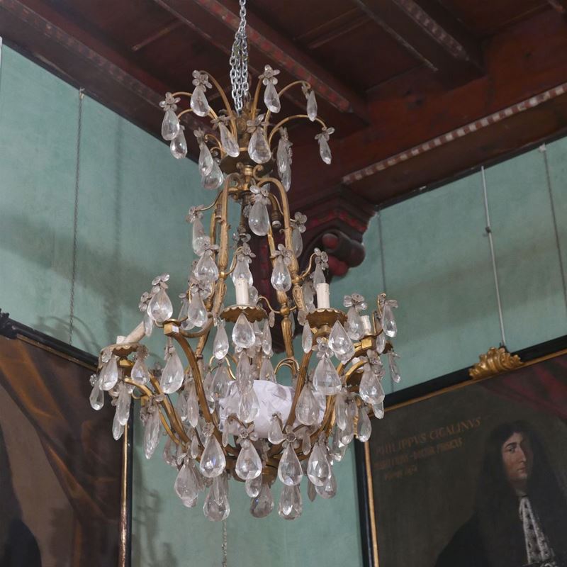 Lampadario in bronzo dorato e cristalli a dodici luci, XIX secolo  - Asta Dipinti e Arredi - Cambi Casa d'Aste