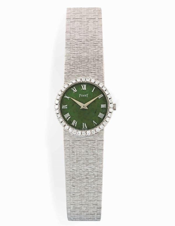 PIAGET, Ref. 9706. Fine and elegant, 18K white gold lady's wristwatch with Nephrite Jade Dial and gold integrated bracelet. Made circa 1960. Original fitted box and warranty certificate.