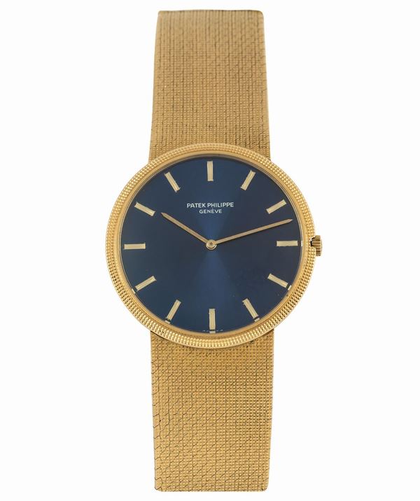 Patek Philippe & Cie, Genève, case No. 2754638, Ref. 3588.1. Fine, flat, self-winding, 18K yellow gold wristwatch with an 18K yellow gold Patek Philippe integrated bracelet. Made circa 1970