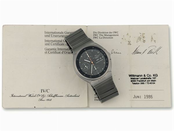 International Watch Co., Schaffhausen, Porsche Design, Chronograph Automatic, Ref. 3700. Fine, self-winding, water-resistant, titanium wristwatch with square button chronograph, registers, tachometer, day/date and an integrated titanium IWC bracelet with deployant clasp. Accompanied by the Guarantee. Made circa 1980