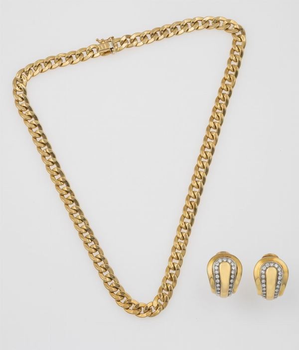 Gold and necklace and a pair of gold and diamond earrings