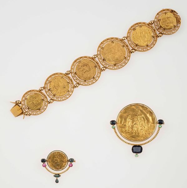 Gold bracelet and two gold brooches